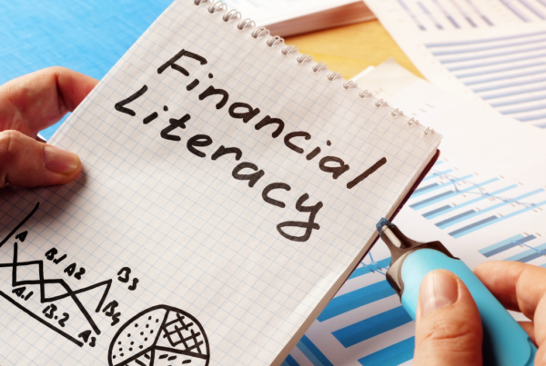 A notepad with the writing financial literacy